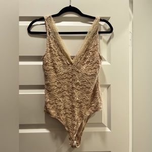Elodie tan lacy bodysuit